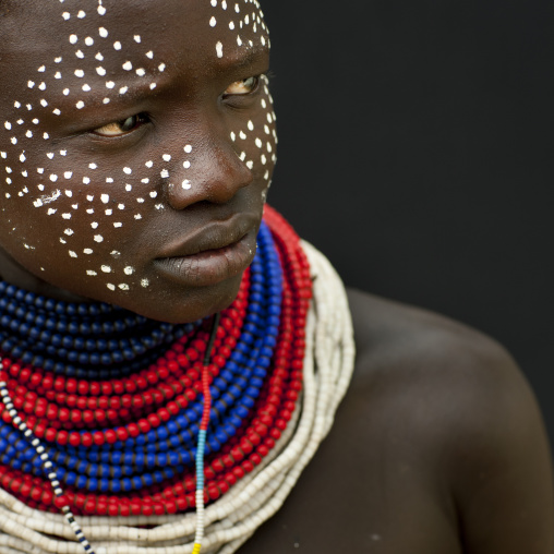 Portrait Of Karo Woman With White Dots Painted On Her Face Ethiopia