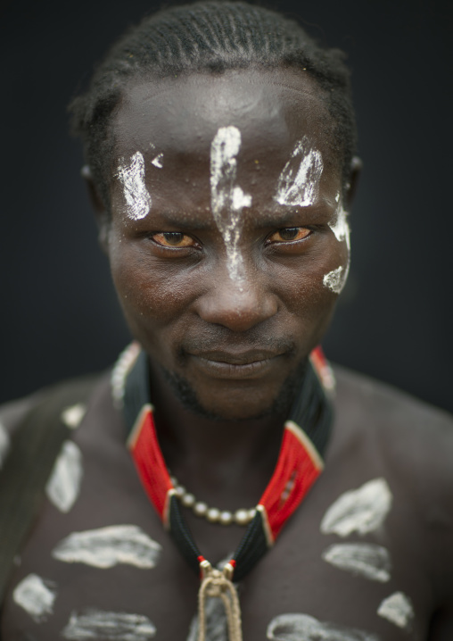 Painted Face And Chest Of Karo Man Portrait  Omo Valley Ethiopia