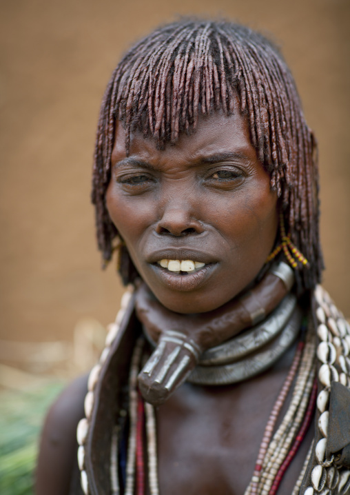 Portrait Of Hamer Beautiful Woman Posing In Front Of Clay House Omo Valley Ethiopia