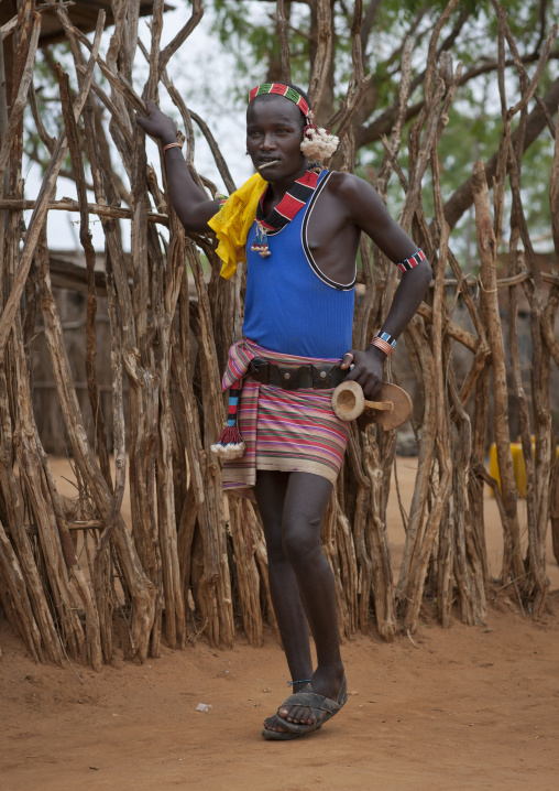Standing Hamer Man With Siwak Stick And Headrest In Turmi Omo Valley Ethiopia