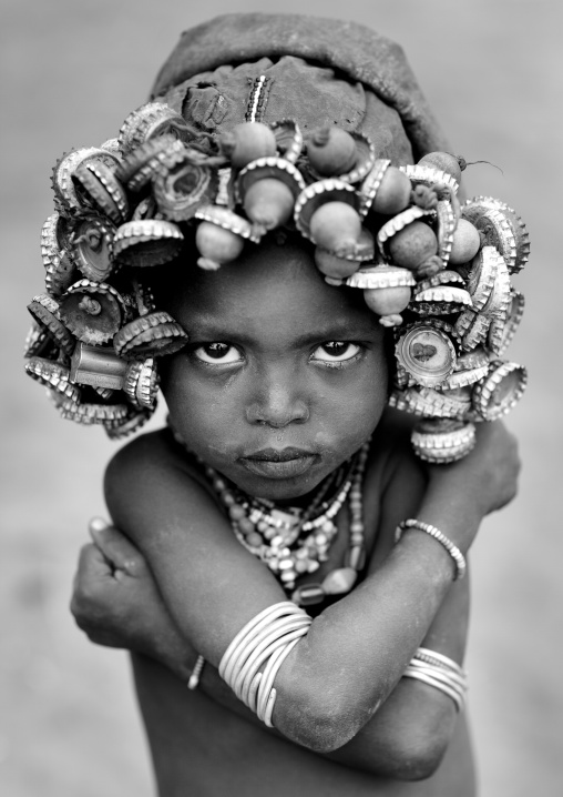 Dassanech Baby Boy Portrait Wearing Bottle Cap  Omo Valley Ethiopia