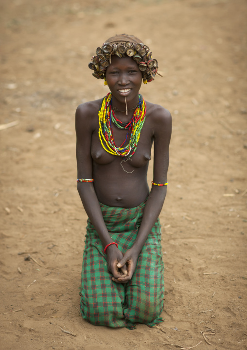 Young Smiling Dassanech Woman Wearing Bottle Caps Headdress Omo Valley Ethiopia