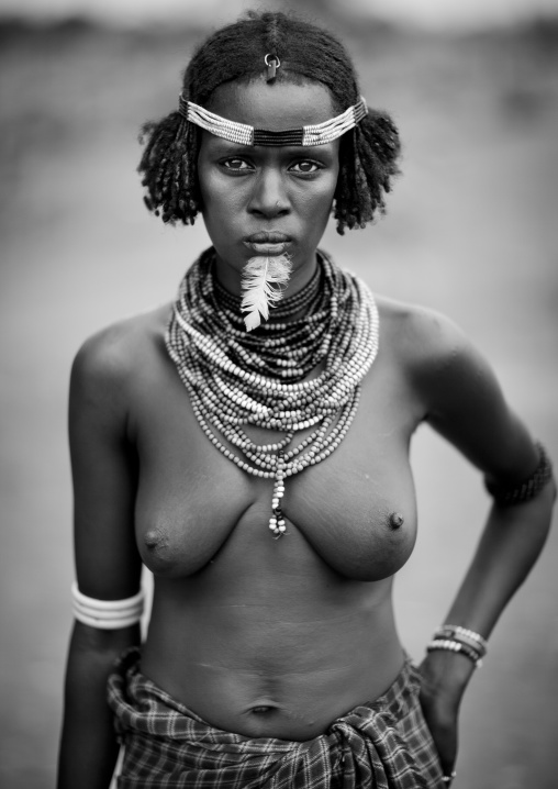 Dassanech Woman Portrait With Beaded Necklaces And Feather Omo Valley Ethiopia