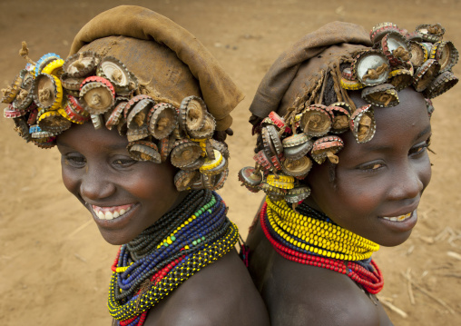 Two Young Dassanech Girls Wearing Bottle Caps Headgear Omorate Ethiopia