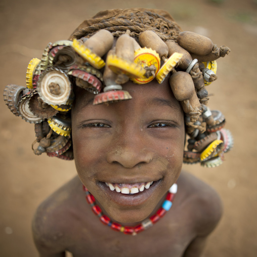 Young Dassanech Boy With Bottle Cap Headgear Smile Omorate Ethiopia