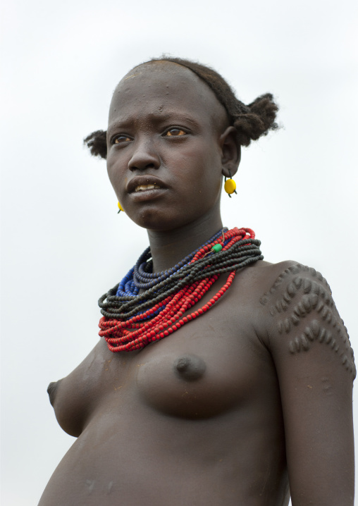 Dassanech Young Woman Portrait With Scarified Shoulder Omorate Ethiopia