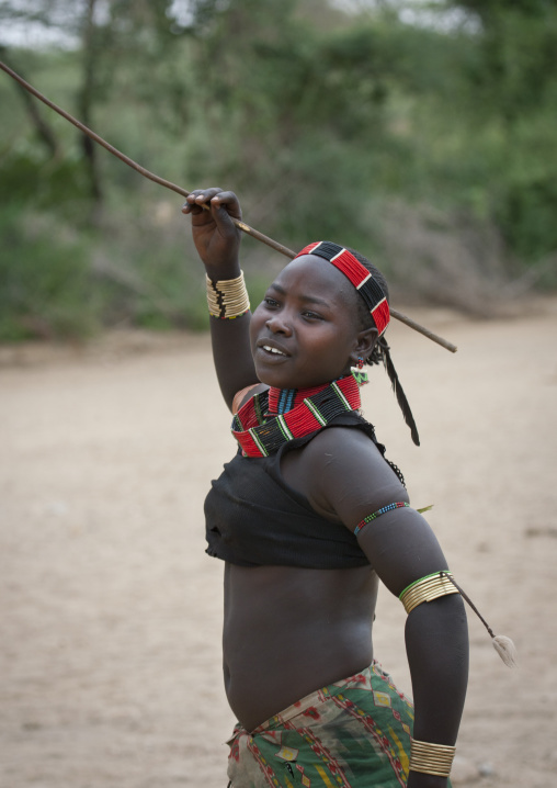 Hamer Girl Holding A Whip In Hand Celebrating Bull Jumping Ceremony Ethiopia