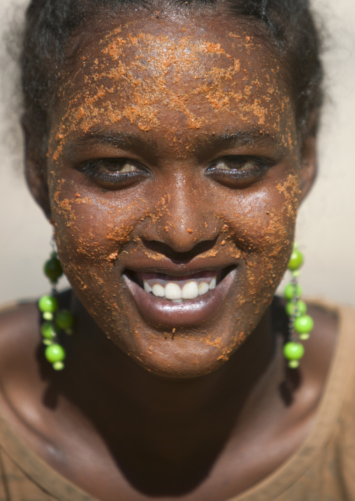 Portrait Of A Harari Woman With Qasil On Her Face As A Beauty Skin Care, Harar, Ethiopia