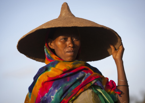 Portrait Of A Oromo Woman Using The Cover Of An Injera Plate As A Hat, Dire Dawa, Ethiopia