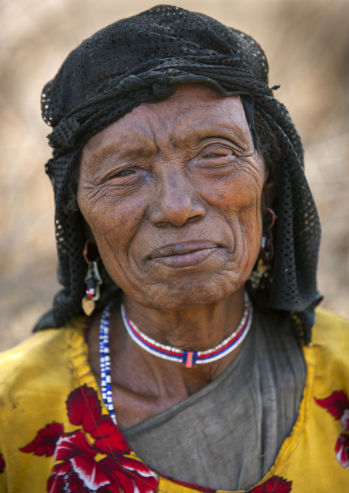 Portrait Of An Old Karrayyu Tribe Woman With Black Headscarf, Metahara, Ethiopia