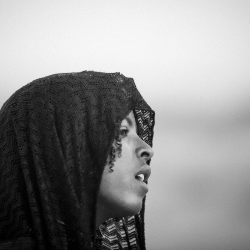 Black And White Profile Portrait Of A Karrayyu Teenage Girl Looking Away During Gadaaa Ceremony, Metahara, Ethiopia