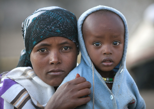Portrait Of A Young Karrayyu Tribe Mother And Her Child At Gadaaa Ceremony, Metahara, Ethiopia