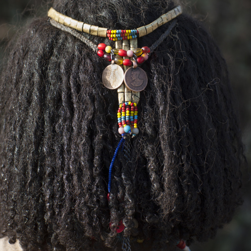 Close-up On The Stranded Hair Of A Karrayyu Tribe Woman With A Headband Made Out Of Pearls And Coins, Gadaaa Ceremony, Metehara, Ethiopia