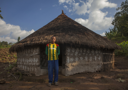 Boy Standing In Front Of His Traditional House, Tepi, Ethiopia