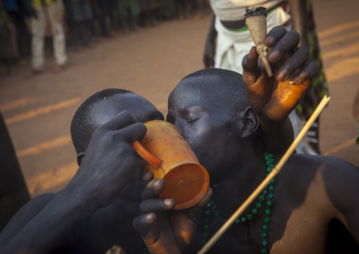 Majang Tribe Men Drinking For A Celebration, Kobown, Ethiopia