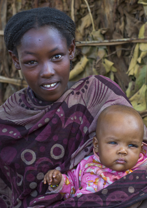 Borana Tribe Mother Carrying Her Baby, Yabelo, Ethiopia