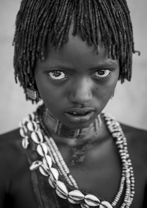 Litte Hamer Girl Tribe In Traditional Outfit, Turmi, Omo Valley, Ethiopia