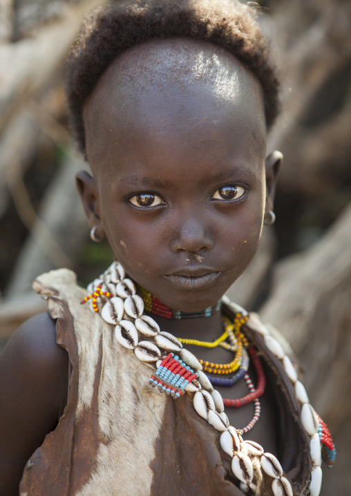Litte Hamer Girl Tribe With Head Half Shaved In Traditional Outfit, Turmi, Omo Valley, Ethiopia