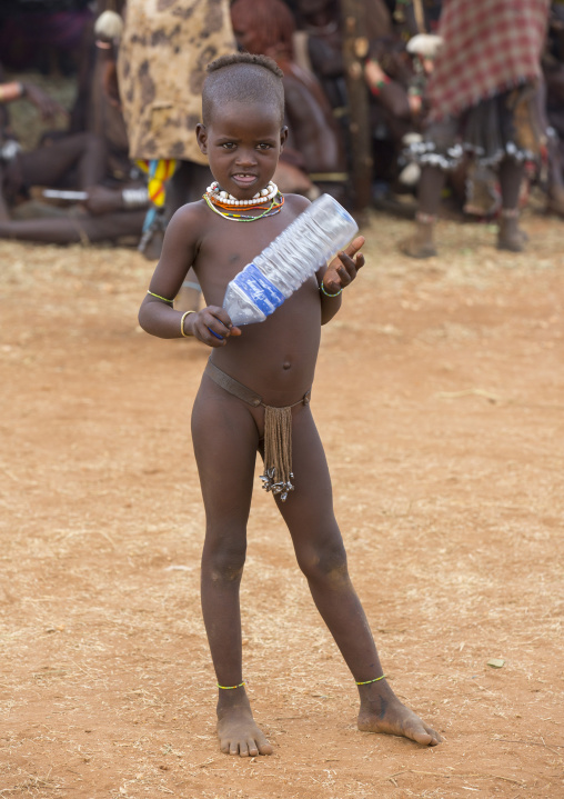Hamer Tribe Girl Holding A Plastic Bottle Turmi, Omo Valley, Ethiopia