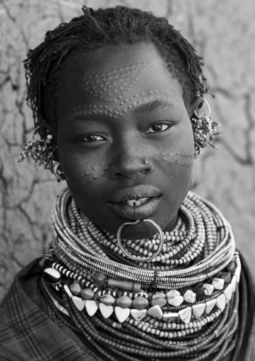 Portrait Of A Topossa Woman, With Traditional Clothes, Omo Valley, Kangate, Ethiopia