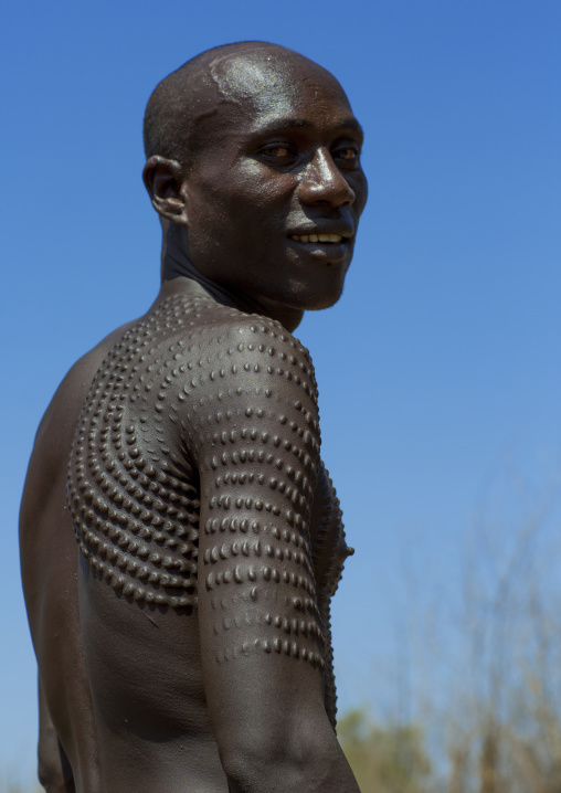 Topossa Man With Scarifications On His Body, Kangate, Omo Valley, Ethiopia