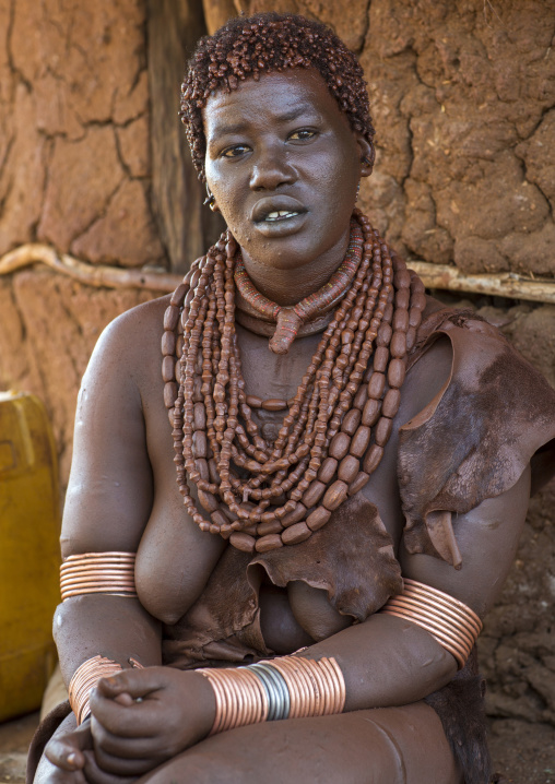 Miss Algo Aska, Uta Hamar Tribe Woman Covered With Red Clay Posing Outside Her Hut, Turmi, Omo Valley, Ethiopia