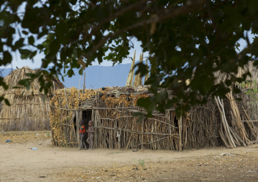 Two Erbore Tribe Children In Front Of Their Hut, Omo Valley, Ethiopia