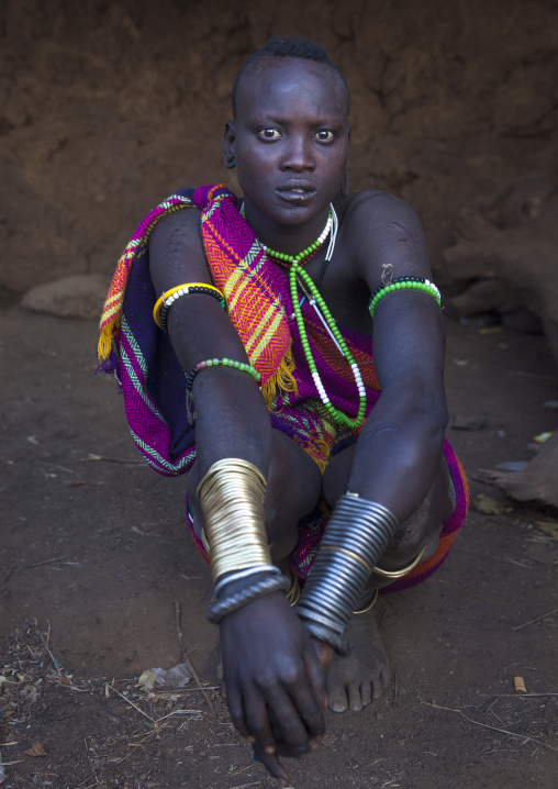 Portrait Of A Bodi Tribe Woman With Copper Bracelets, Hana Mursi, Omo Valley, Ethiopia