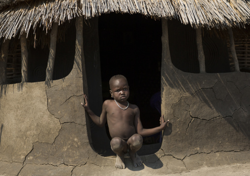 Nuer Tribe Little Boy At The Entrance Of His Hut, Gambela, Ethiopia