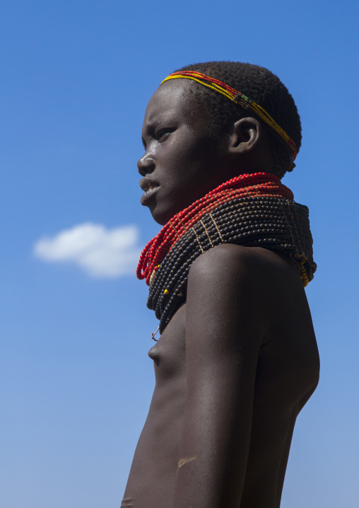 Portrait Of A Nyangatom Tribe Girl With Huge And Colourful Necklaces, Omo Valley, Kangate, Ethiopia