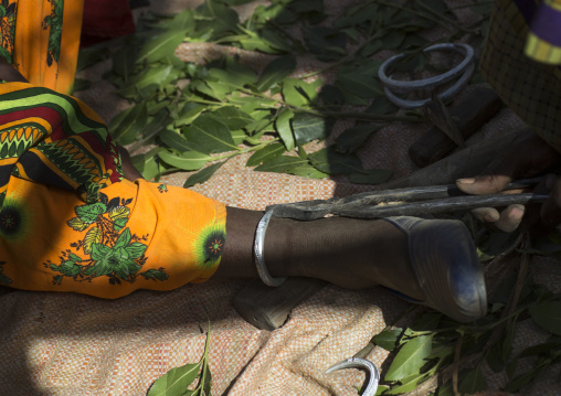 Karrayyu Blacksmith Putting A New Ankle On A Girl For Her Wedding, Metahara, Ethiopia