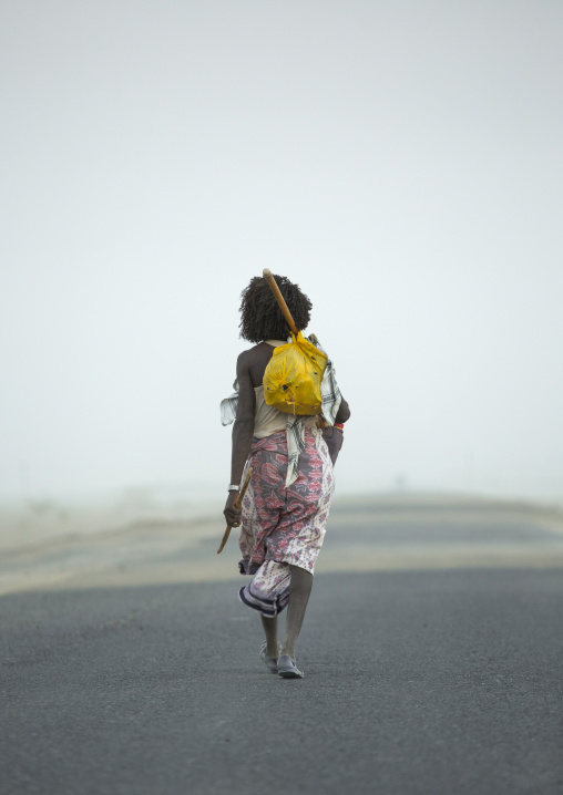 Afar Tribe Man Alone Along A Road, Assayta, Ethiopia