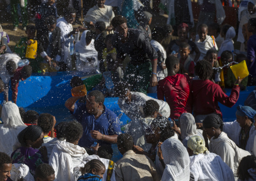 Holy Water Sprayed Onto The Crowd Attending Timkat Celebrations Of Epiphany, Lalibela, Ethiopia