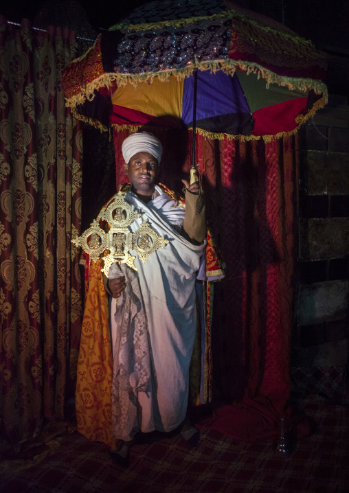 Priest Inside Yemrehana Krestos Rock Church, Lalibela, Ethiopia