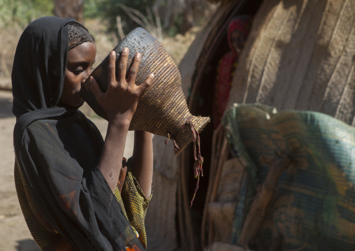 Fatouma Mahammed From Afar Tribe Drinking Camel Milk, Afambo, Ethiopia
