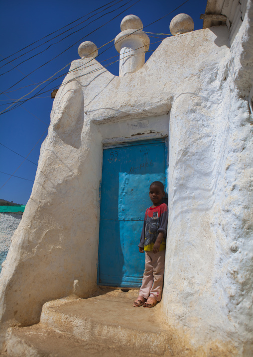 Kid Standing At The Entrance Of A Mosque In The Old Town, Harar, Ethiopia