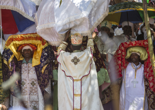 Priests Carrying Some Covered Tabots On Their Heads During Timkat Epiphany Festival, Lalibela, Ethiopia