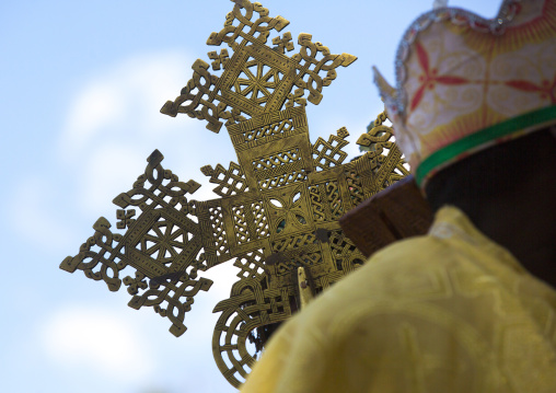Ethiopian Orthodox Priest Holding A Cross During The Colorful Timkat Epiphany Festival, Lalibela, Ethiopia