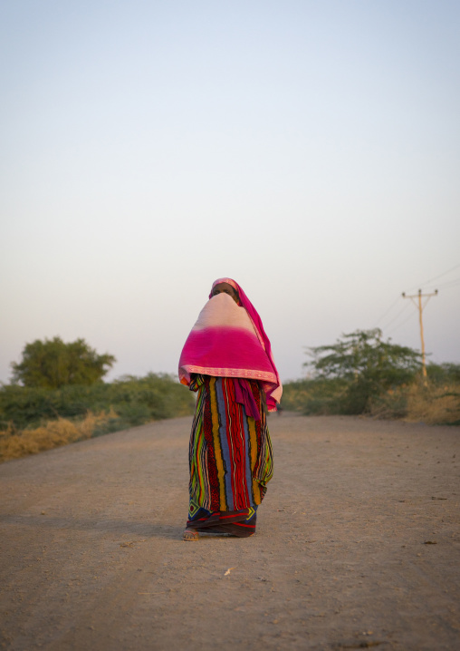 Afar Tribe Woman Standing In The Middle Of A Road, Afambo, Afar Regional State, Ethiopia