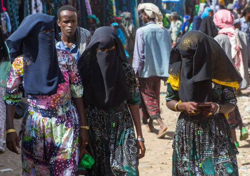 Women in burqa on a market, Oromo, Sambate, Ethiopia