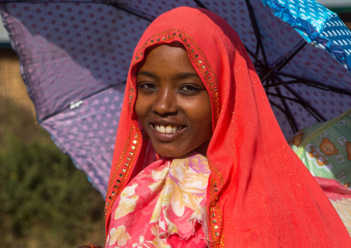 Portrait of an oromo woman with red veil, Oromo, Sambate, Ethiopia