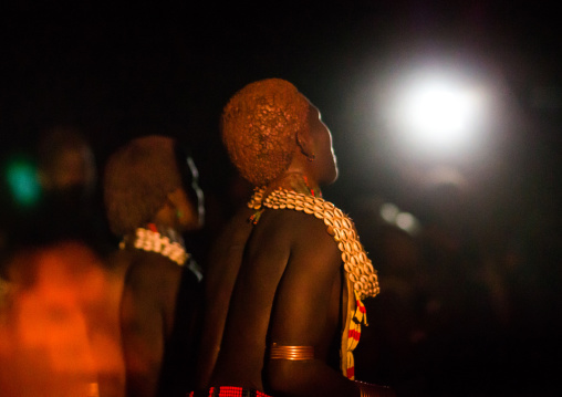 Hamer tribe teenage girls dancing at night, Omo valley, Turmi, Ethiopia