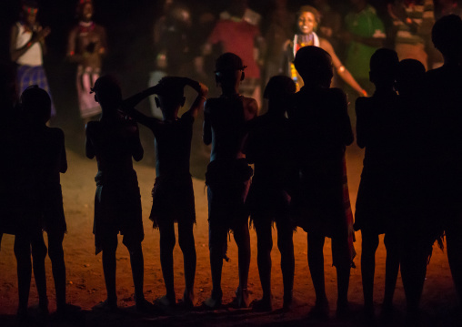 Hamer tribe people dancing at night, Omo valley, Turmi, Ethiopia