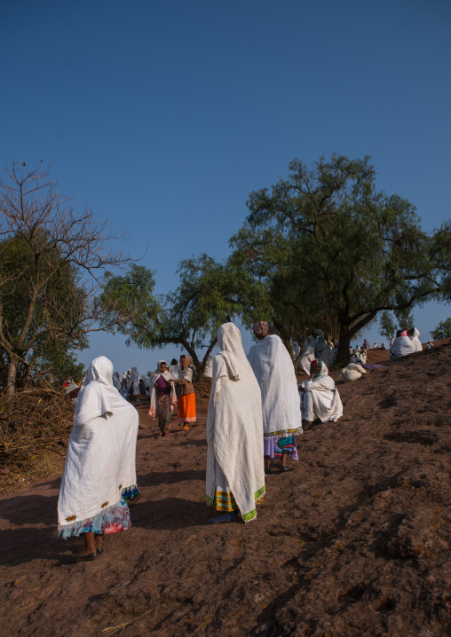 Ethiopian women walking along a hill, Amhara region, Lalibela, Ethiopia