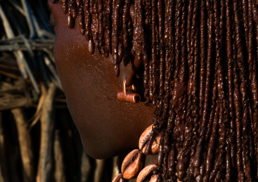 Close up of a brass earring of a hamer tribe girl, Omo valley, Turmi, Ethiopia