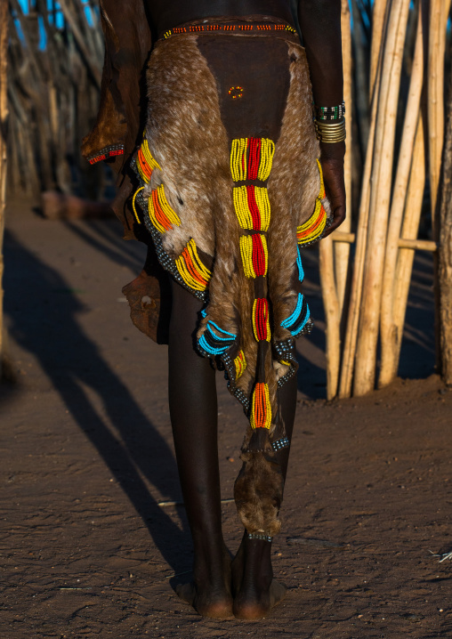 Hamer tribe teenage girl traditional skirt, Omo valley, Turmi, Ethiopia
