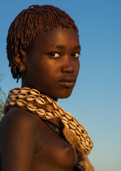 Portrait of a hamer tribe teenage girl, Omo valley, Turmi, Ethiopia