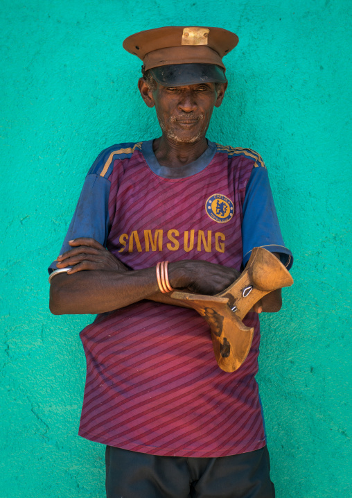 Portrait of a hamer tribe old man with chelsea football shirt, Omo valley, Turmi, Ethiopia