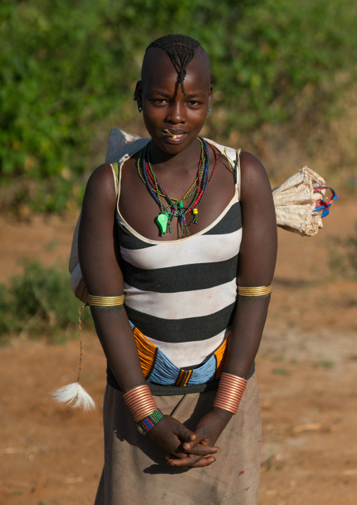 Hamer tribe woman carrying a bag, Omo valley, Turmi, Ethiopia