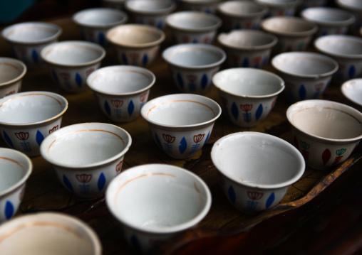Table with traditional empty coffee cups, Semien wollo zone, Woldia, Ethiopia